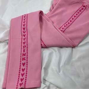 PINK Heart shaped leggings, size medium